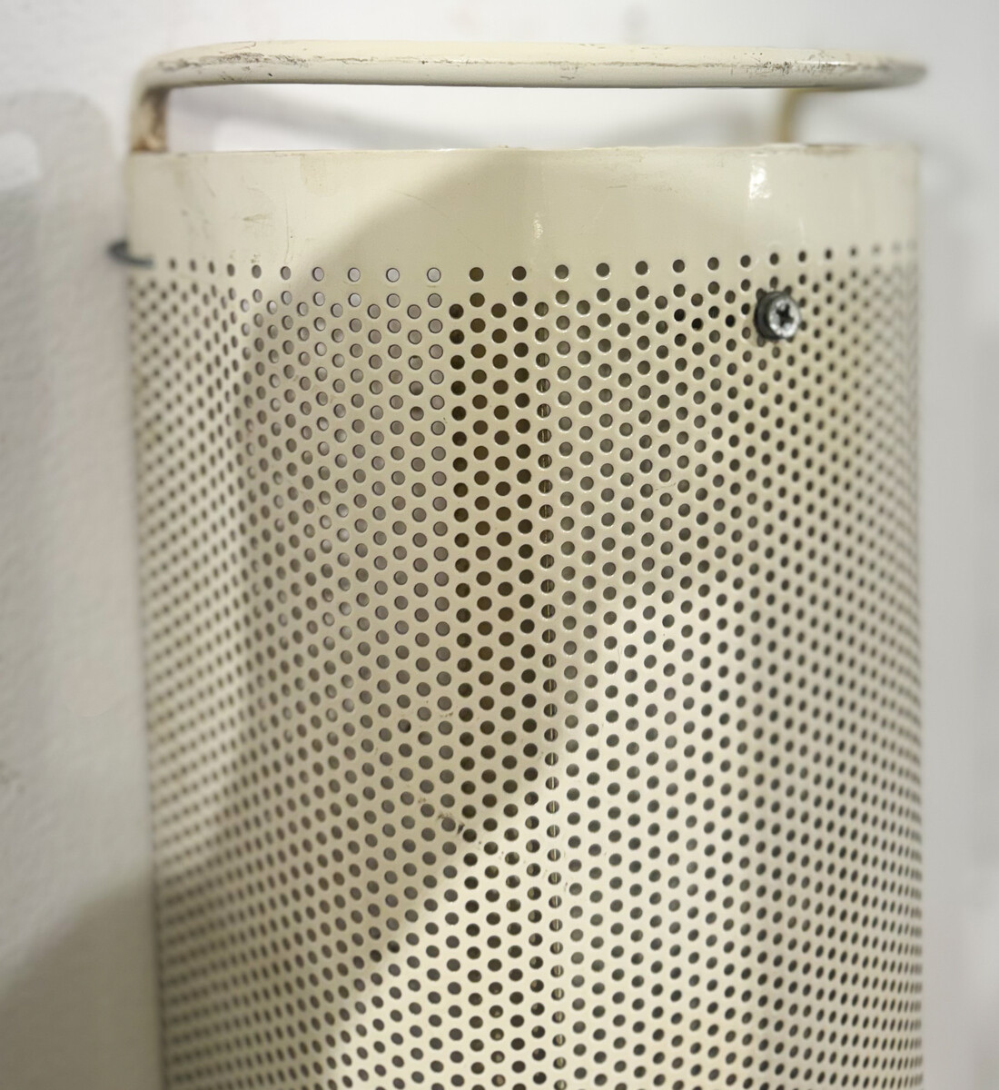 Pair of white perforated metal wall lights, 1980, France